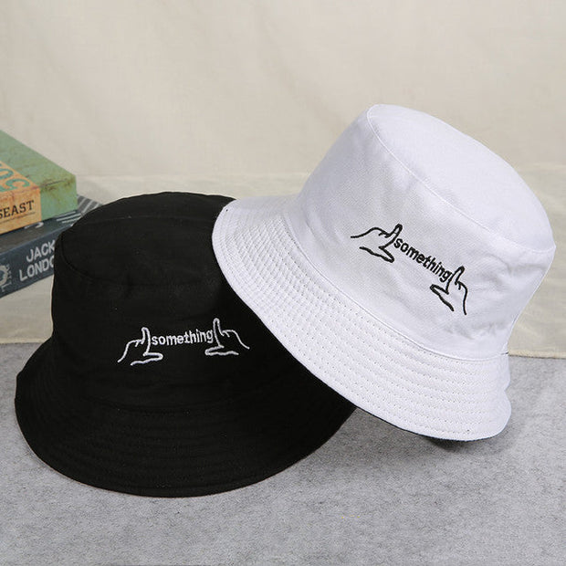 Black and white cotton bucket fisherman hats with embroidered "something" design for men and women summer sunshade