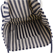 Interior view of a striped canvas bag showing navy and white vertical stripes with a small inner pocket, designed as a high capacity shoulder tote for casual shopping.