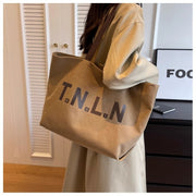 Khaki canvas Letter Printed Tote bag with large capacity and shoulder strap for women, featuring zipper closure and retro style
