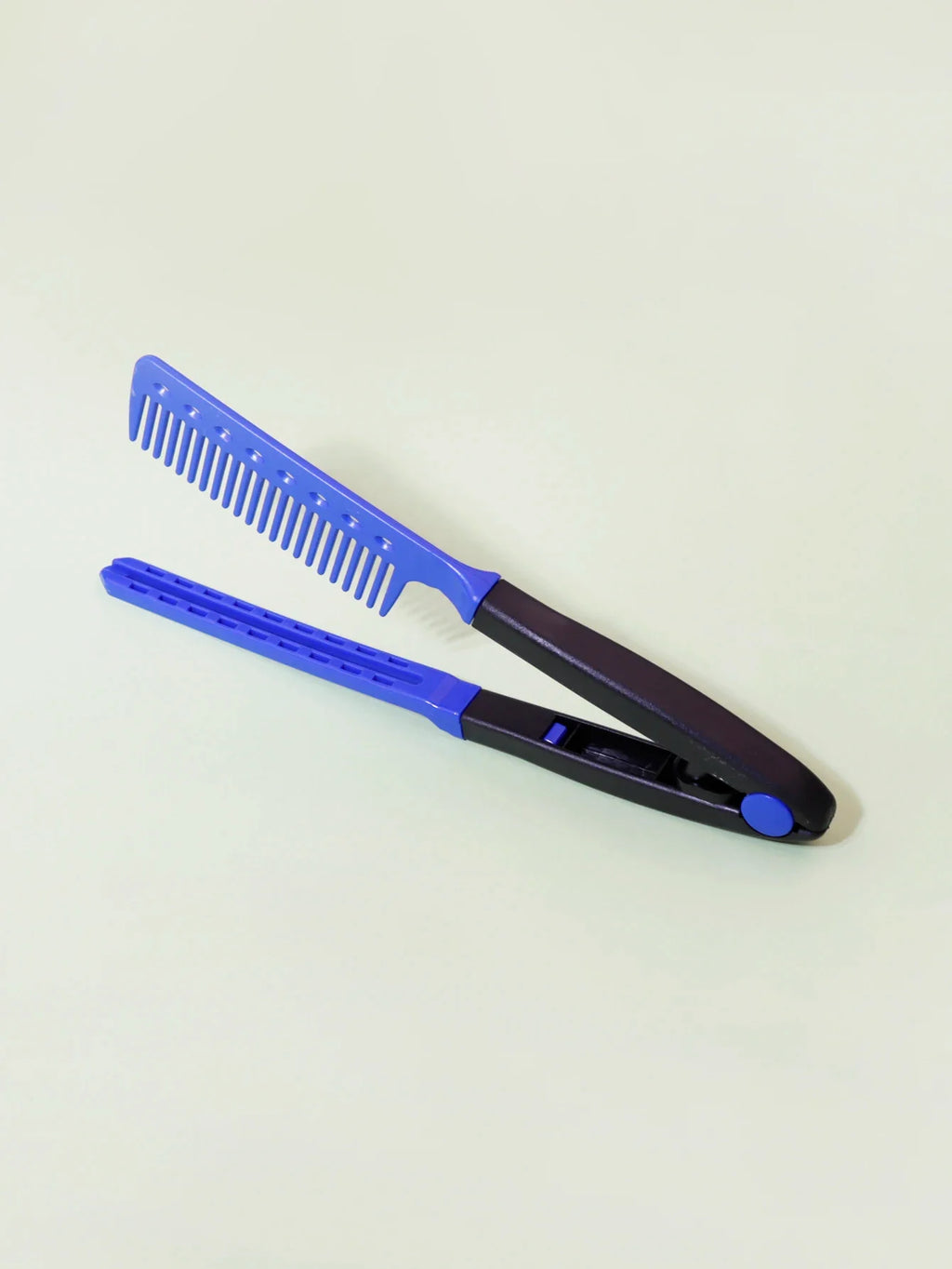 Blue and black flat comb straight hair styling tool with V-shaped design for salon use
