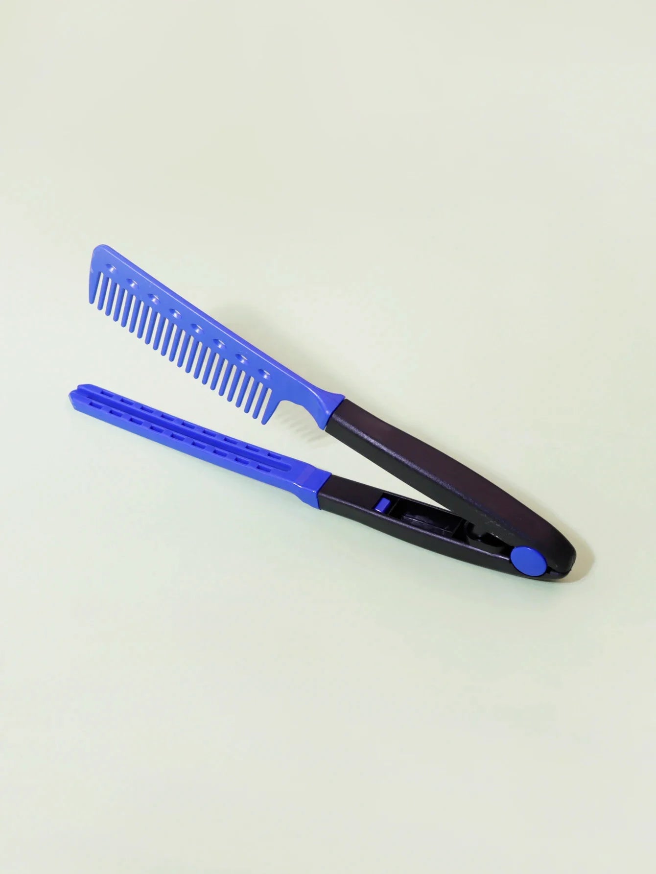 Blue and black flat comb straight hair styling tool with V-shaped design for salon use