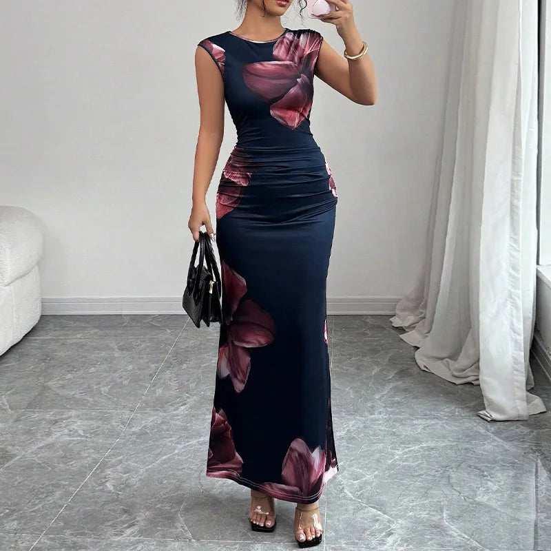 Slim sleeveless navy blue bodycon maxi dress with large pink floral print and O-neck design for women summer party.