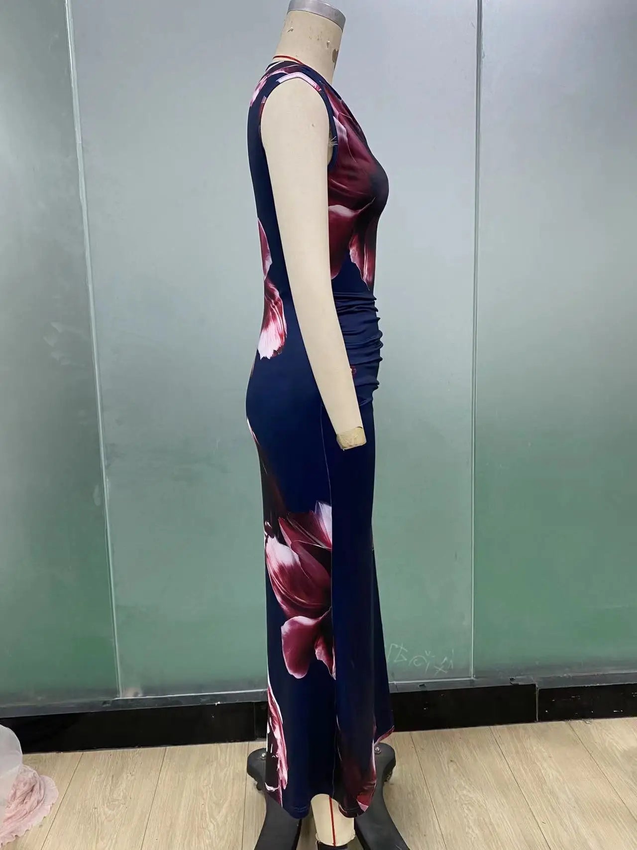 Sexy bodycon maxi dress for women with sleeveless design, o-neck, floral print, and ankle-length slim fit for summer parties.