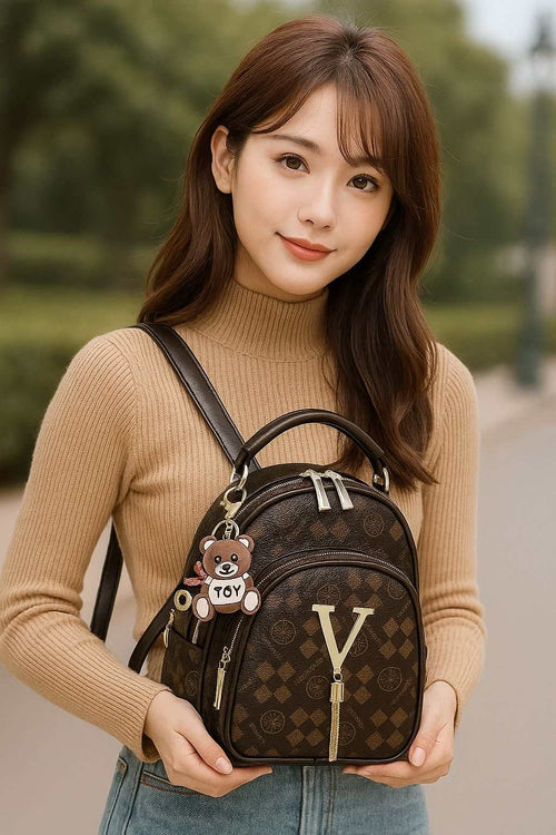Woman holding Aurelia Luxe Shoulder Bag, luxury 2024 designer, large capacity, lightweight, versatile crossbody and shoulder style, elegant for everyday or special occasions